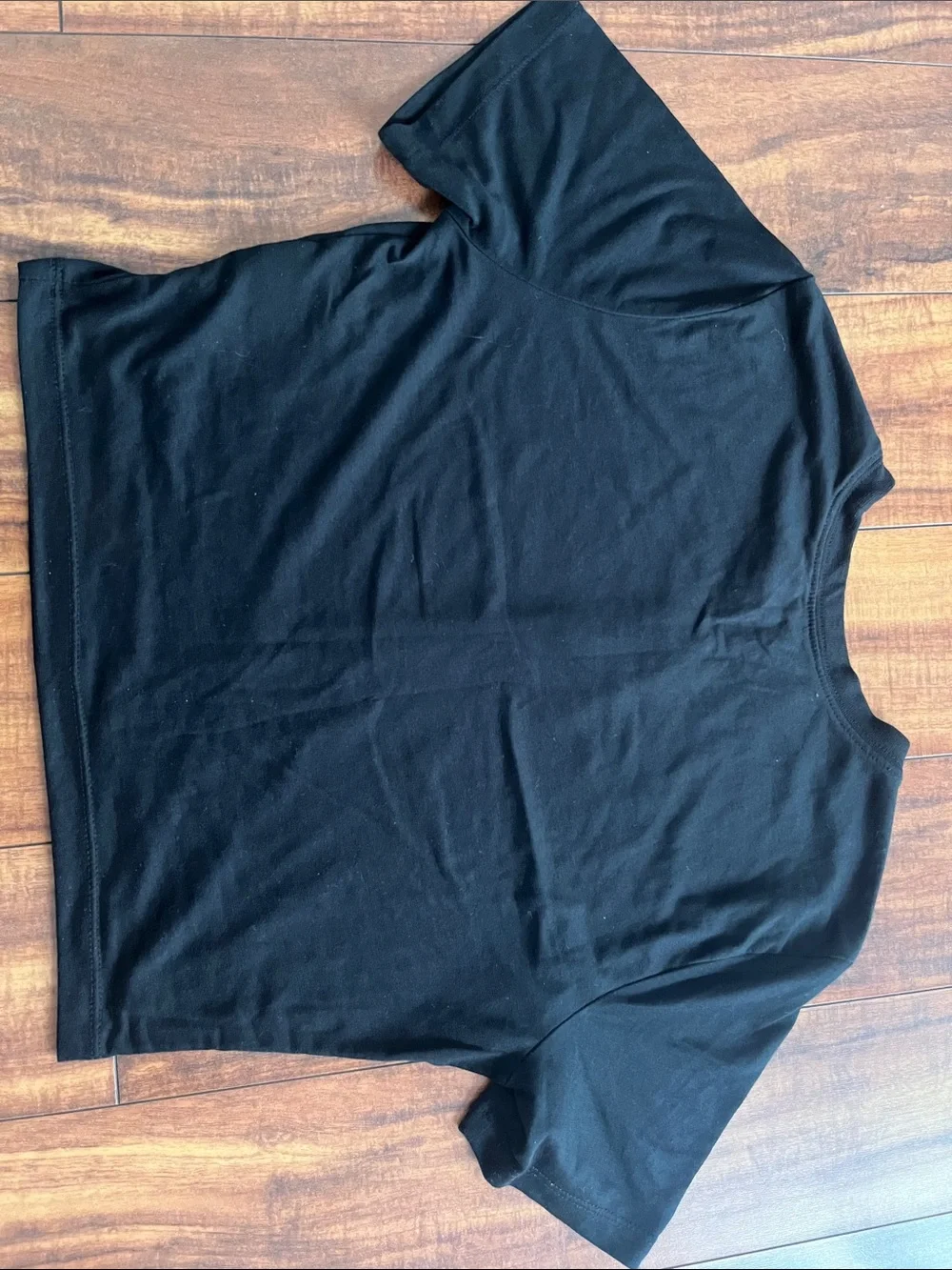 Nike Black Short-Sleeve Graphic Crop Tee with White Swoosh Accent